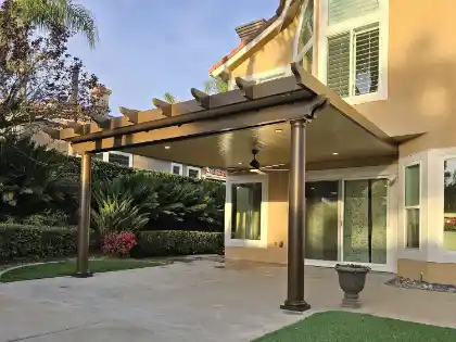 Attached patio cover with scalloped tails and fibreglass columns | Charleston Concrete
