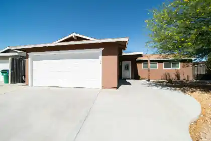 House exterior with centrally positioned garage | Charleston Concrete