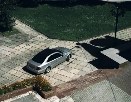 Overhead view of silver car on stamped concrete driveway | Charleston Concrete