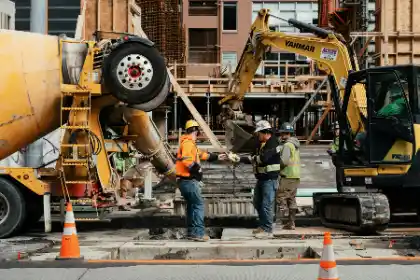 Two men standing together at construction site | Charleston Concrete
