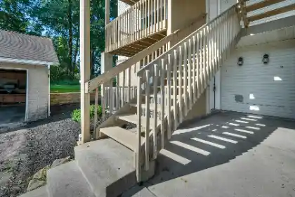 Wooden outdoor staircase providing access above ground level | Charleston Concrete
